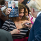 Donald Trump signs a woman’s chest at a December 2015 rally in Manassas, Virginia (Associated Press)